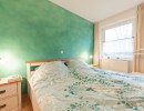 Ferienwohnung Sternenwiese auf Föhr, Schlafzimmer mit Doppelbett